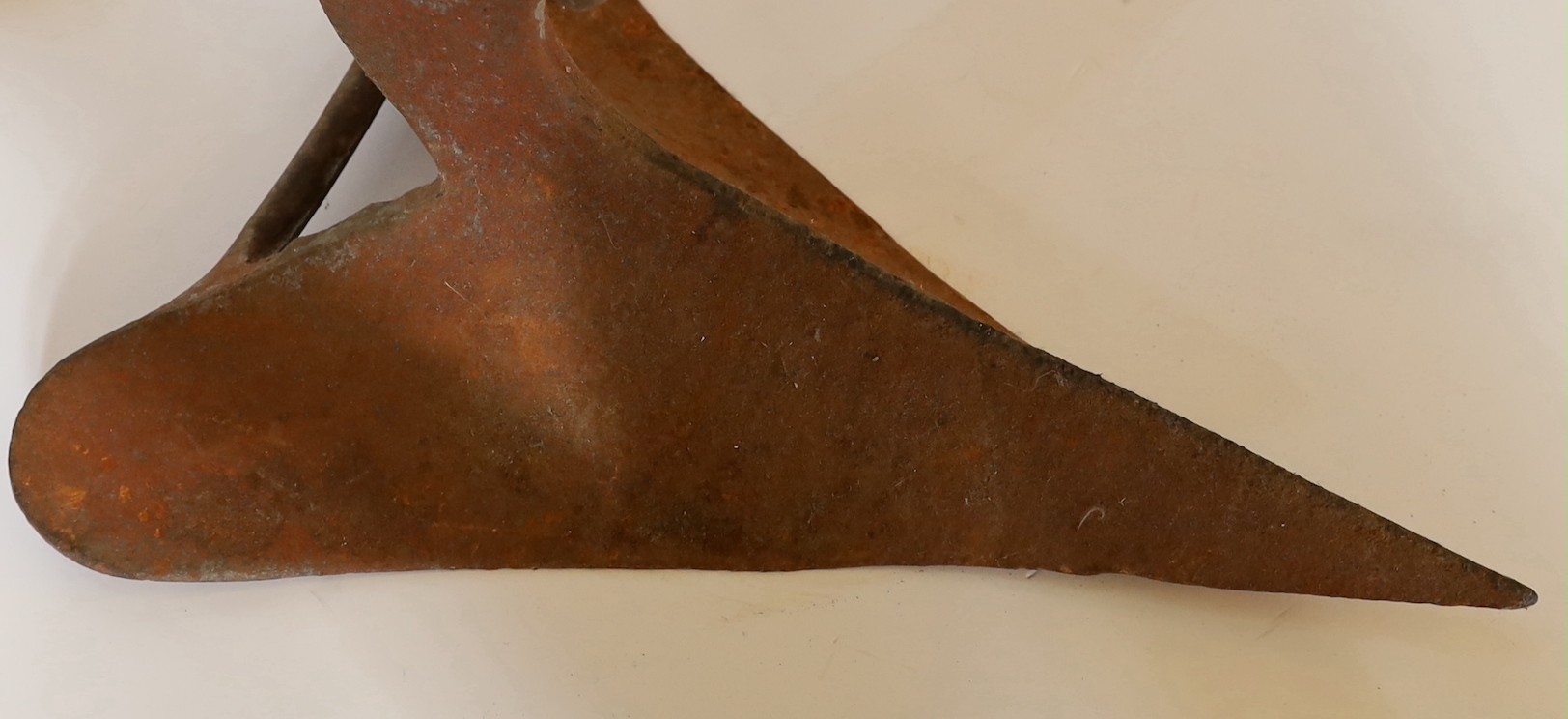 A silver painted cast iron hinged plough anchor, stamped 35’ C.Q.R. pat.pend, 102cm